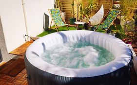 Superbe appartement avec jacuzzi avec jardin privé